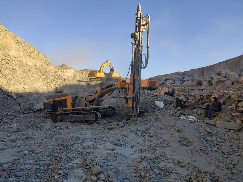 Drilling on the open pit bench